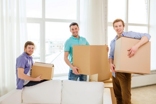 Specialist piano moving team preparing an instrument for relocation in Watford