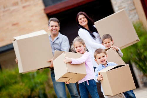 Family home unpacking support in Watford with boxes and organised rooms