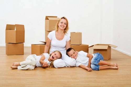 House movers carrying furniture safely in Watford