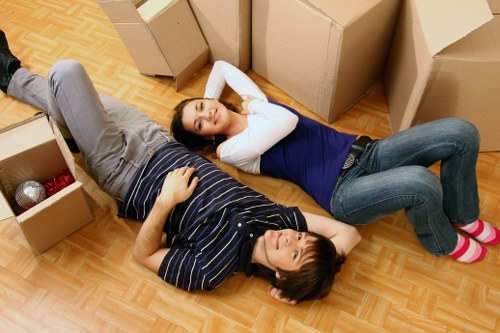 Professional removals team working safely with insured van service