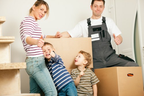 Careful packing for removals in Watford with labeled boxes and protective materials